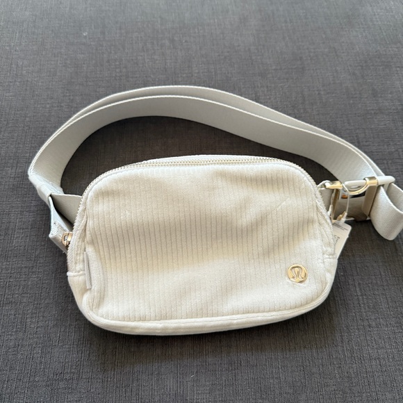 lululemon athletica Handbags - Lululemon Athletica Velour Corduroy Cream Crossbody Bag 1 ltr Rare Gold Hardware